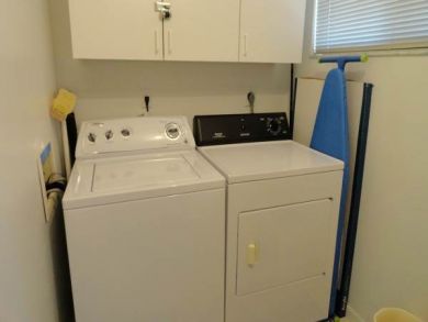 Laundry room with washer and dryer